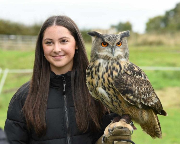 Lady holding an owl