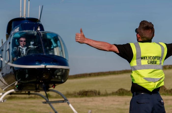 a helicopter taking off as part of a helicopter ride for 1