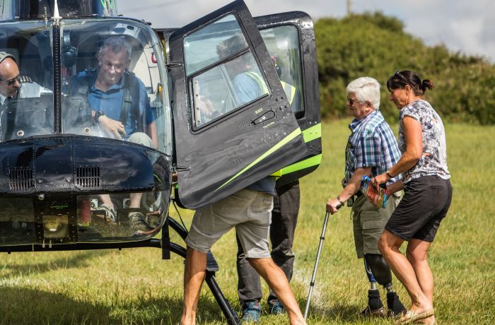 people getting into a helicopter as part of a helicopter experience day
