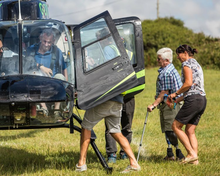 people getting into a helicopter as part of a helicopter experience day