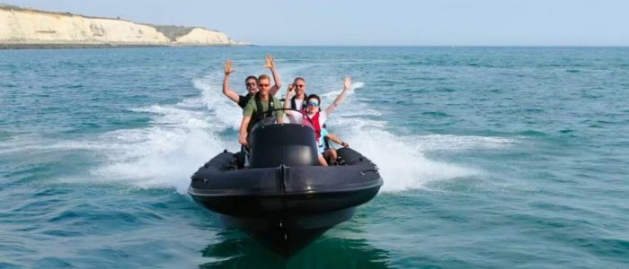 Group of people in a powerboat