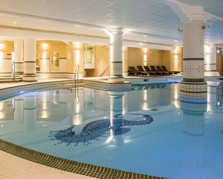 The indoor swimming pool area of spa hotel dunston hall in norfolk