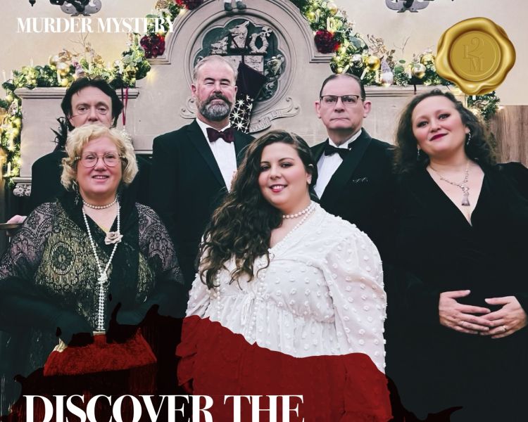 a group of actors dressed up smartly in black tie for a murder mystery dinner experience