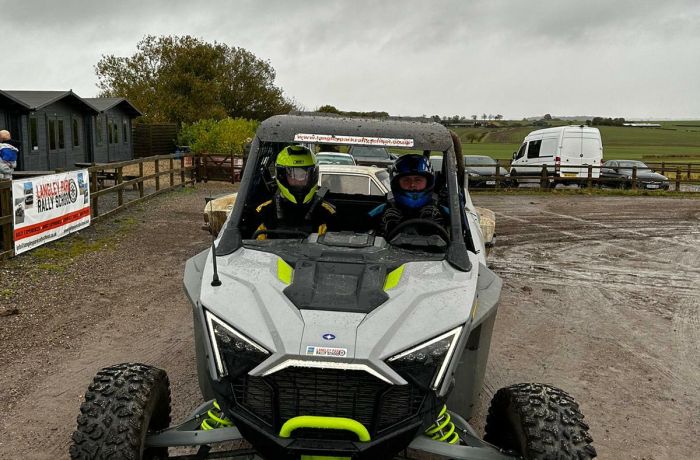 the polaris rzr turbo r buggy on a gravel track ready for a driving experience