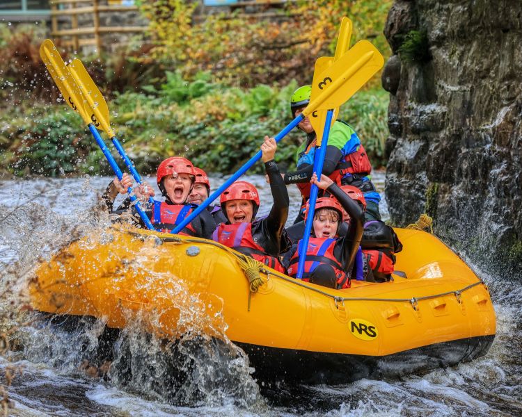 Boat on rapids min