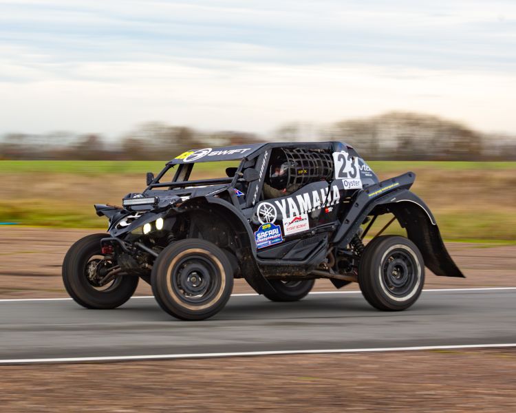 a yamaha xyz1 000r dakar rally prepared yamaha on a track for a jump driving experience