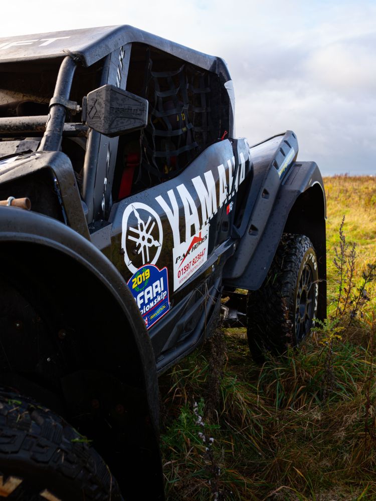 a yamaha xyz1 000r dakar rally prepared yamaha on a dirt track for a jump and dirt driving experience