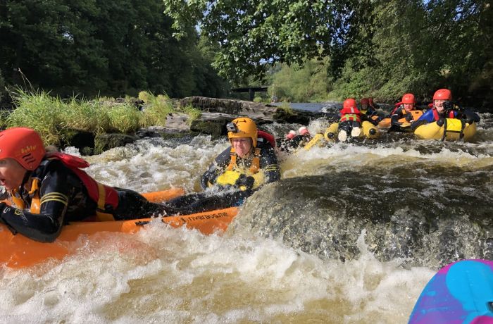 a group on a river bug experience on a river in wales