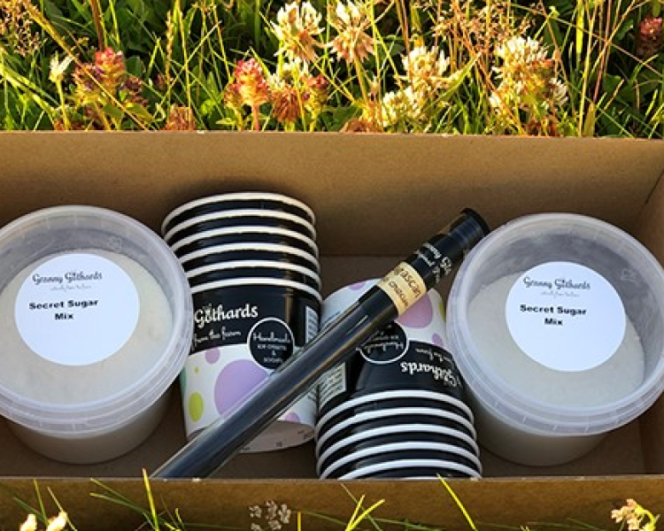 an ice cream making kit in a box including pots, toppings and ice-cream to make at home