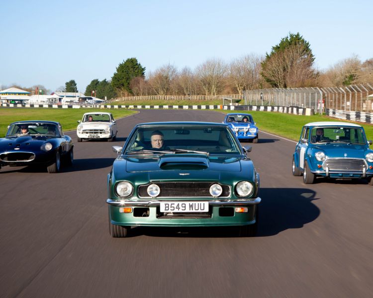 british classic cars on a race track as part of a driving experience day gift