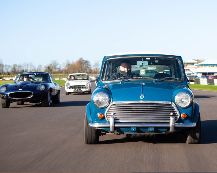 british classic cars on a race track as part of a driving experience day gift