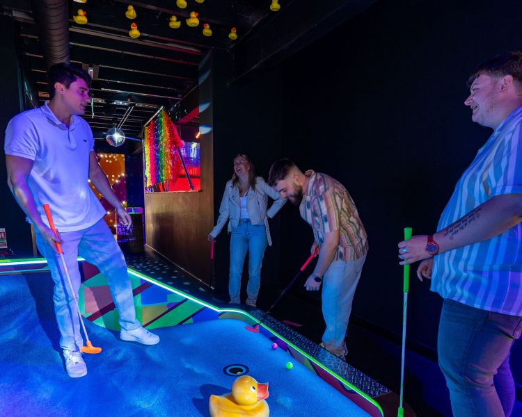 Rubber duck themed indoor golf min
