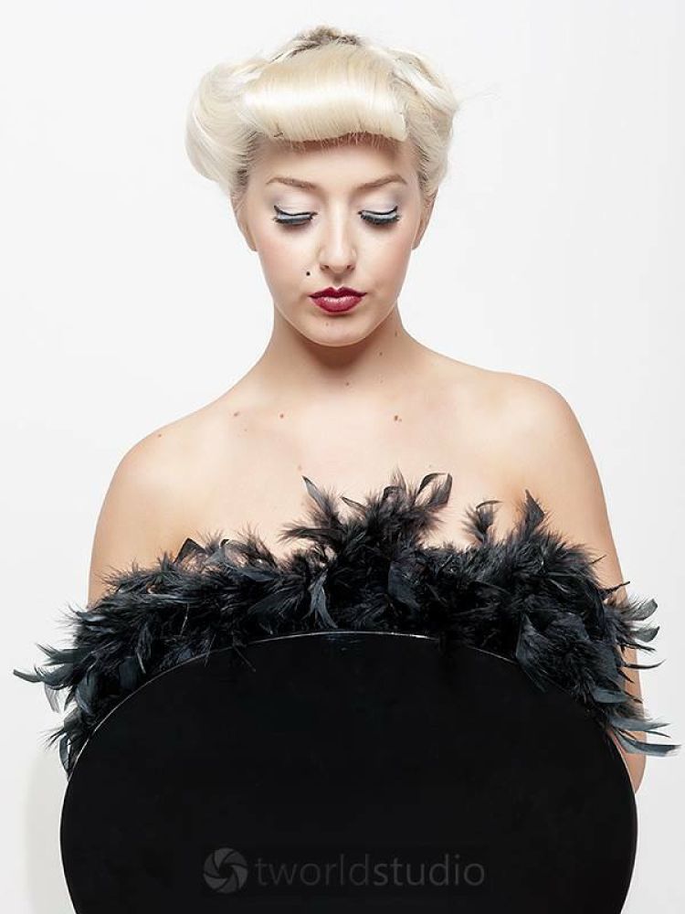 woman in vintage inspired hair and makeup on a photoshoot