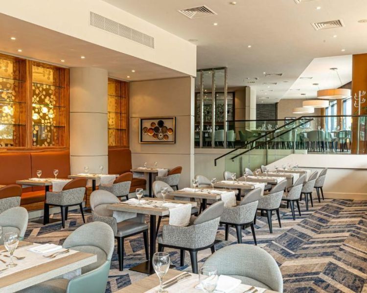 the restaurant area inside a hotel