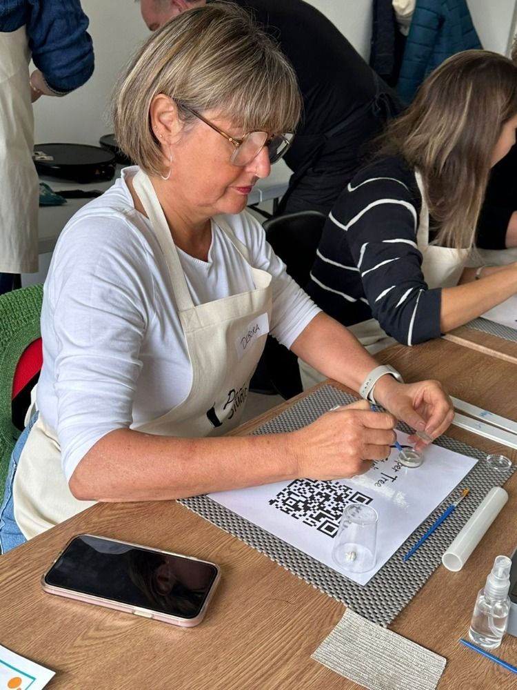 a woman on a silver clay taster workshop working on her creation