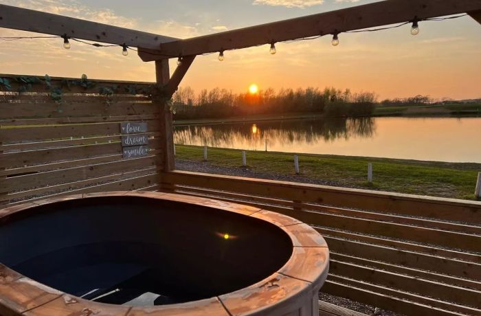 Outdoor hot tub and sunset