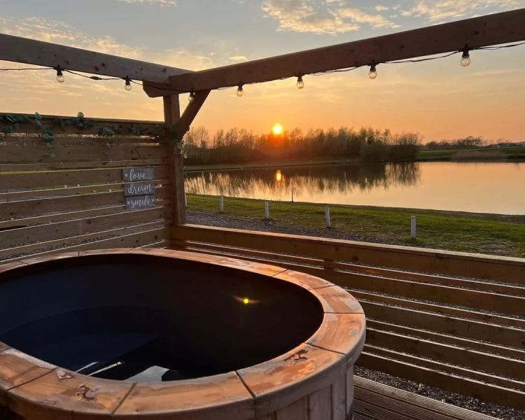 Outdoor hot tub and sunset