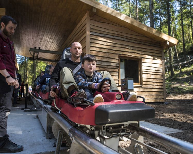people getting ready to go on the fforest coaster at zip world in wales