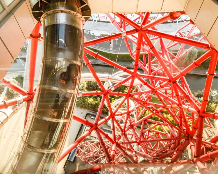 person going down the zip world helix at the arcelormittal orbit in london