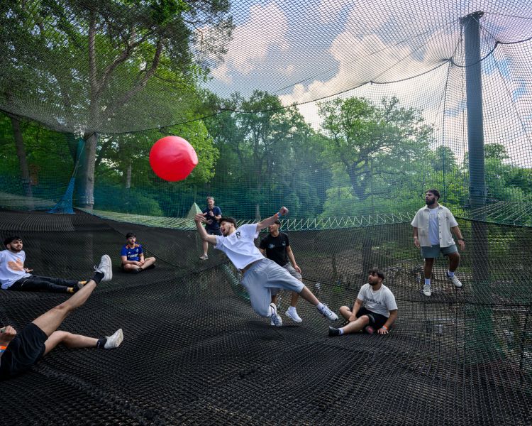 people playing on the nets at zip world treetop nets