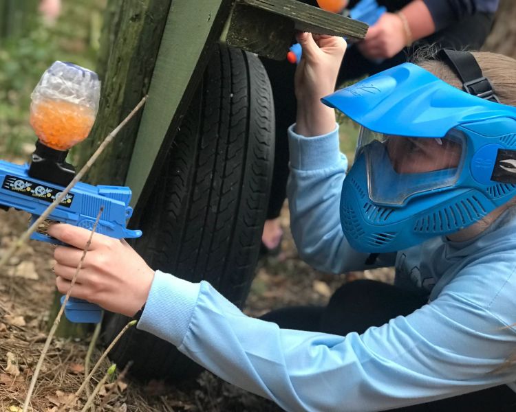 Young girl wearing a blue helmet