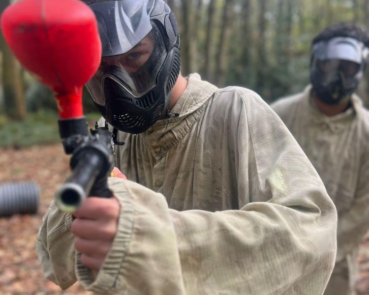 Guy with paintball gub