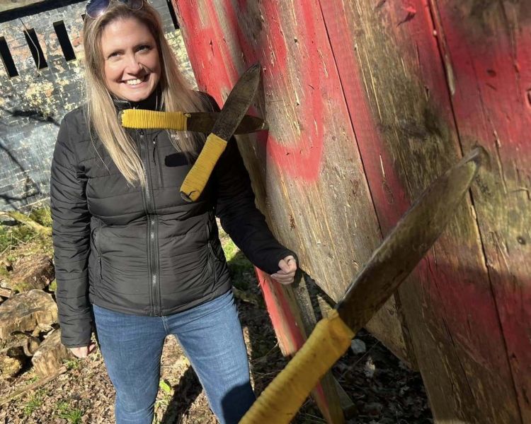 Knife throwing outdoors