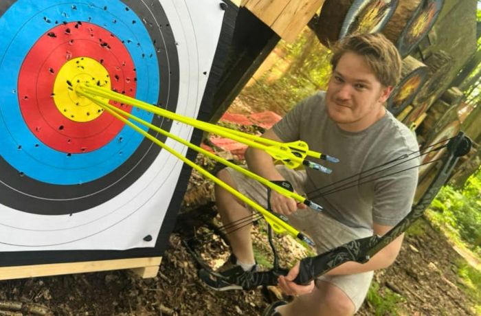 Man in an archery experience