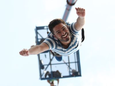 man doing a bungee jump on a bungee jump experience day