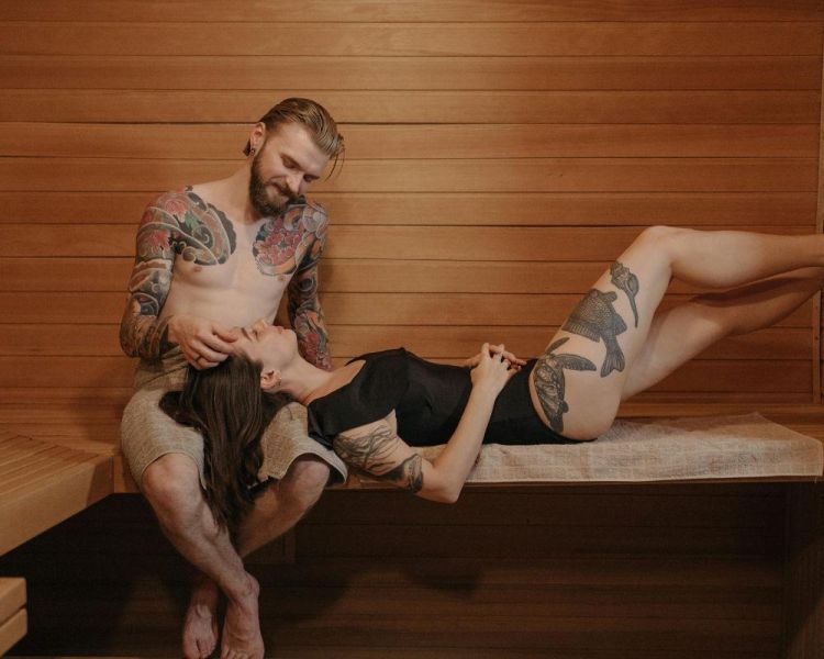 Man and woman in a sauna...