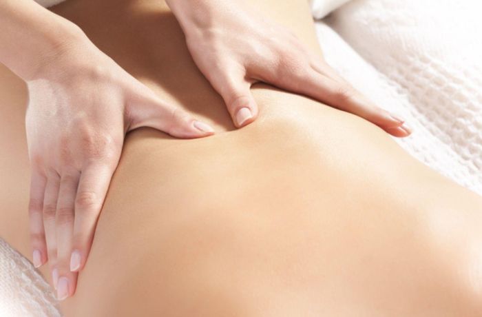 Woman having a back massage