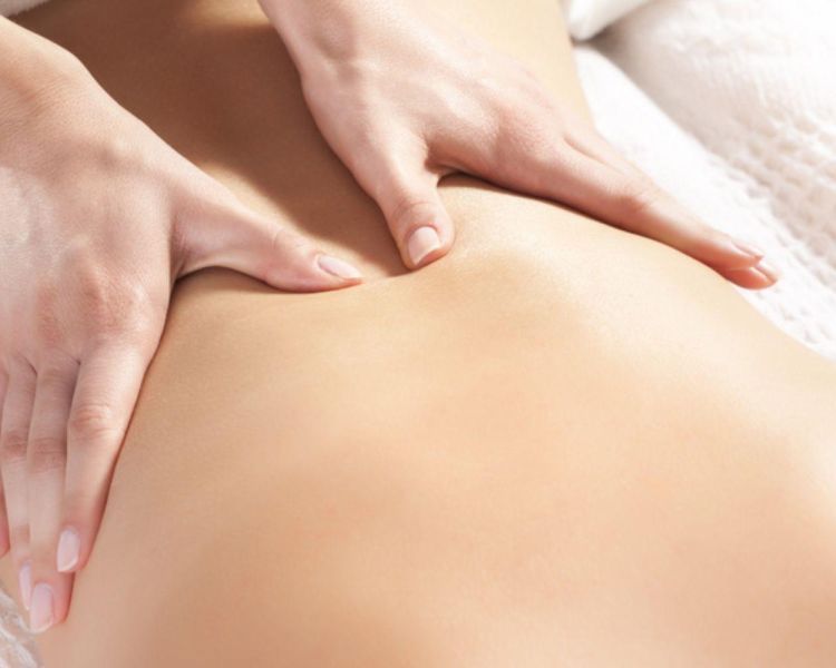 Woman having a back massage