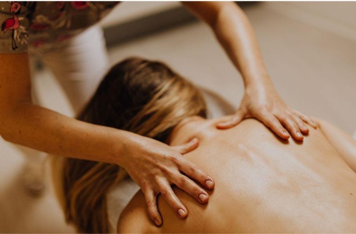 Woman having a back massage