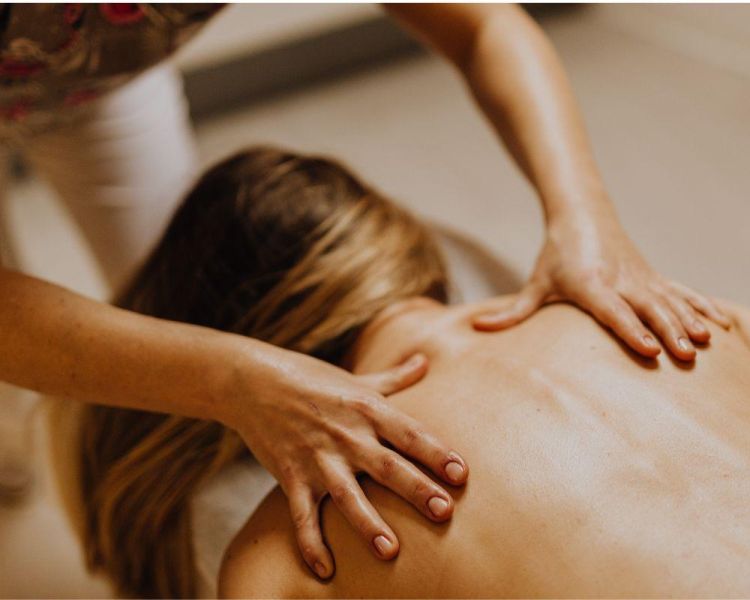 Woman having a back massage