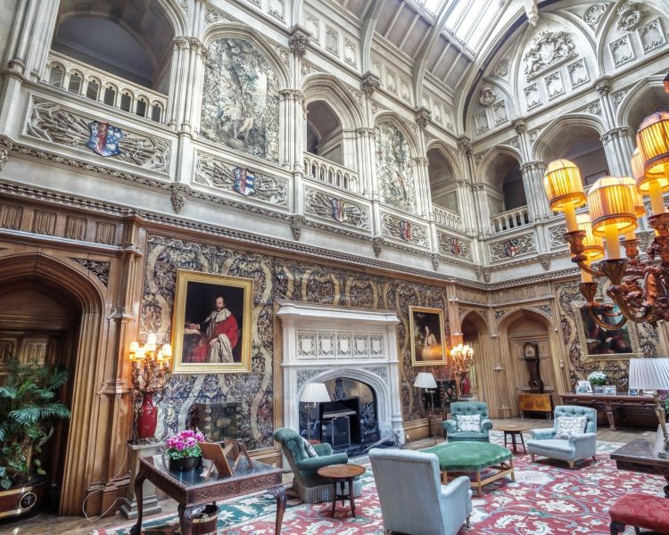the drawing room of highclere castle that was used for the filming of downtown abbey seen on a guided coach tour of downtown abbey