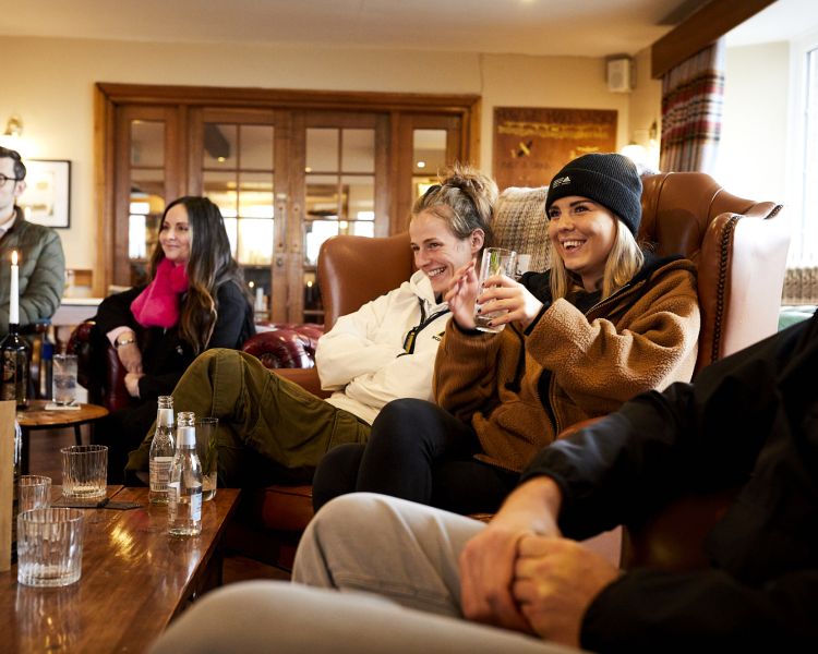 people enjoying sampling drinks on a distillery tour with forest distillery in cheshire