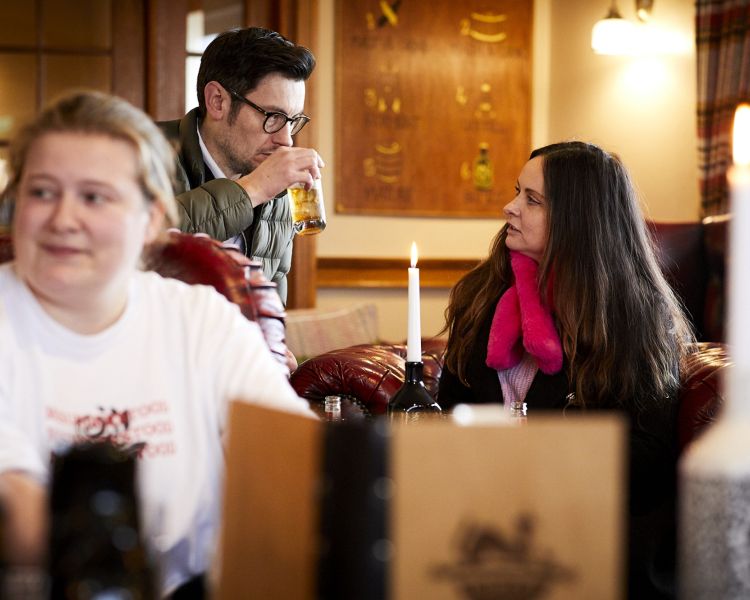 people enjoying sampling drinks on a distillery tour with forest distillery in cheshire