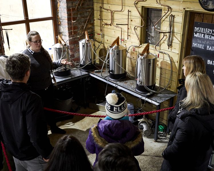 people on a distillery tour with forest distillery in cheshire