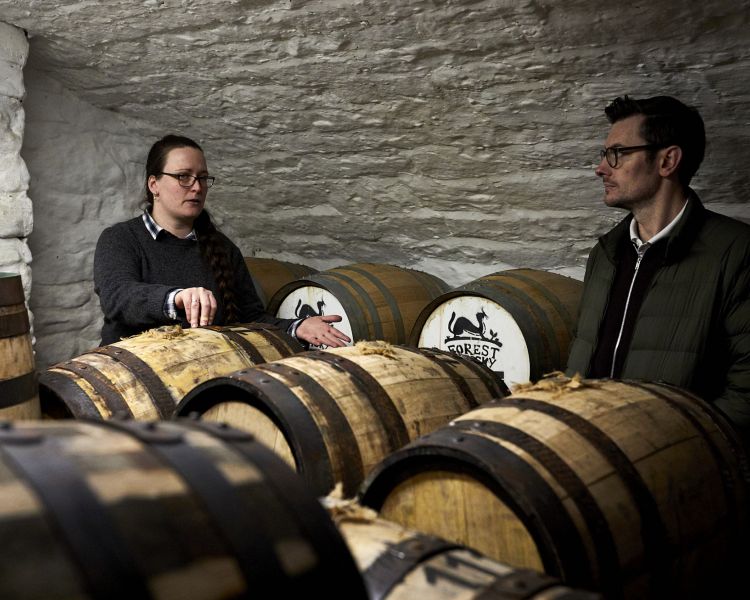 barrels being shown on a distillery tour with forest distillery in cheshire
