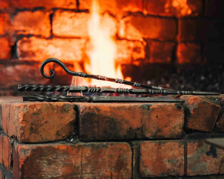 three harry potter style wands made of iron on a blacksmith experience