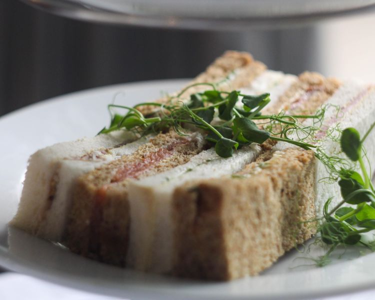 a close up of the sandwiches for an afternoon tea at a country house hotel in hertfordshire