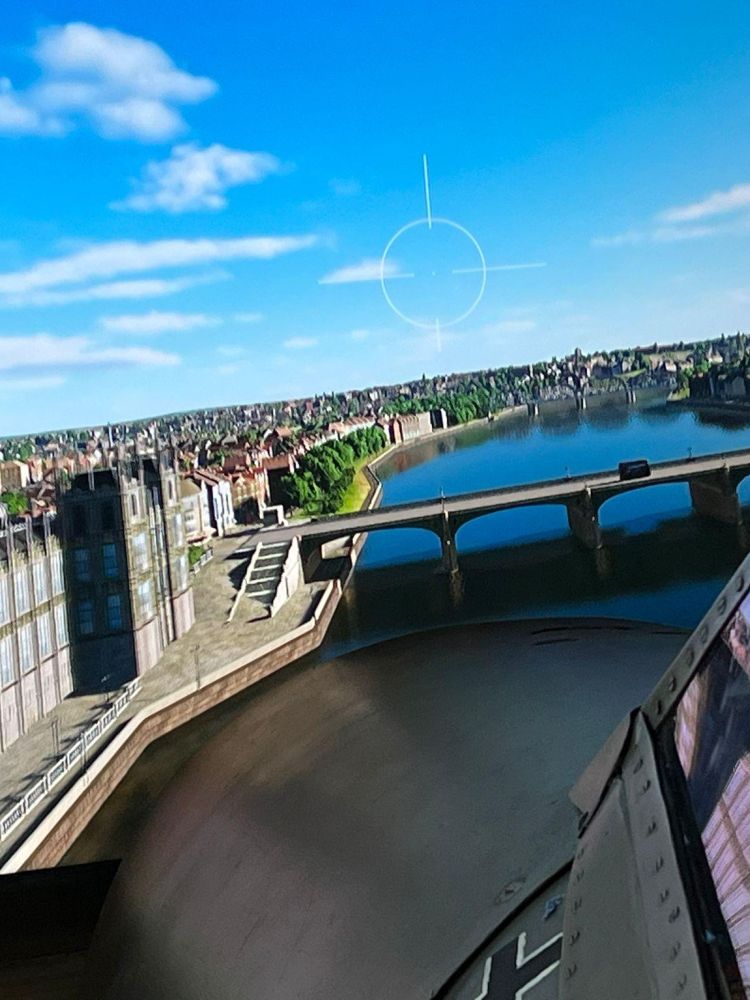 a london scene showing big ben seen on the screen of a spitfire flight simulator