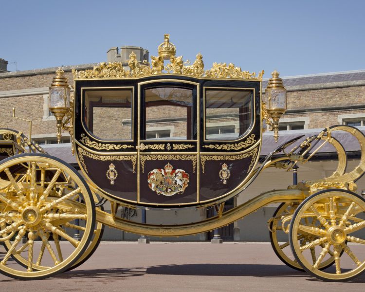 the diamond jubilee state coach in the grounds at the royal mews in london
