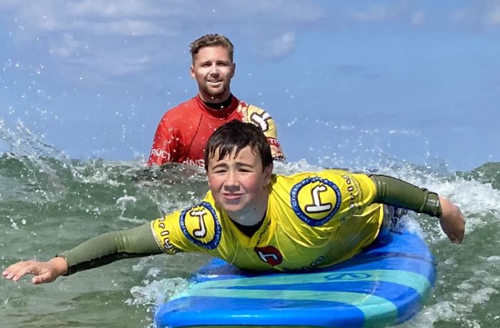 Young boy surfing