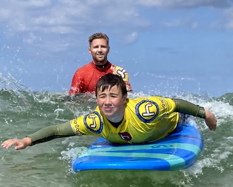 Young boy surfing