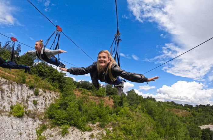 Girl flying on zipline