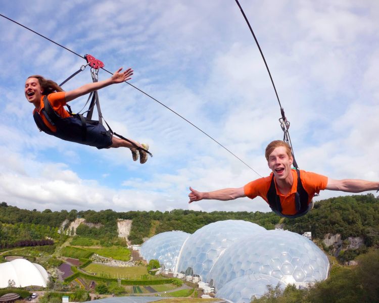 Boy and girl on a zipwire