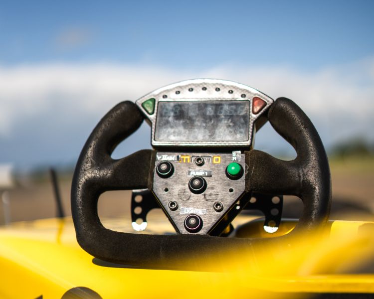 close up shot of the steering wheel on a jordan f1 race car