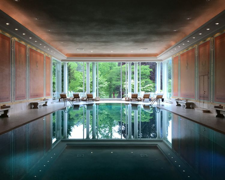 Sun loungers by a swimming pool
