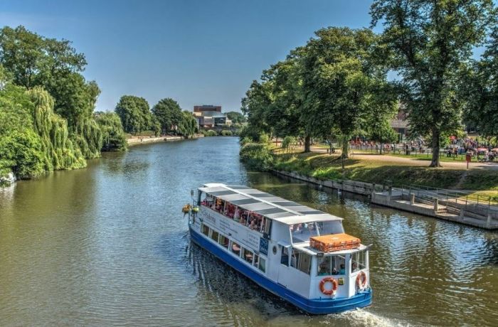 the sabrina river cruise boat sailing down the river severn on a sunny day